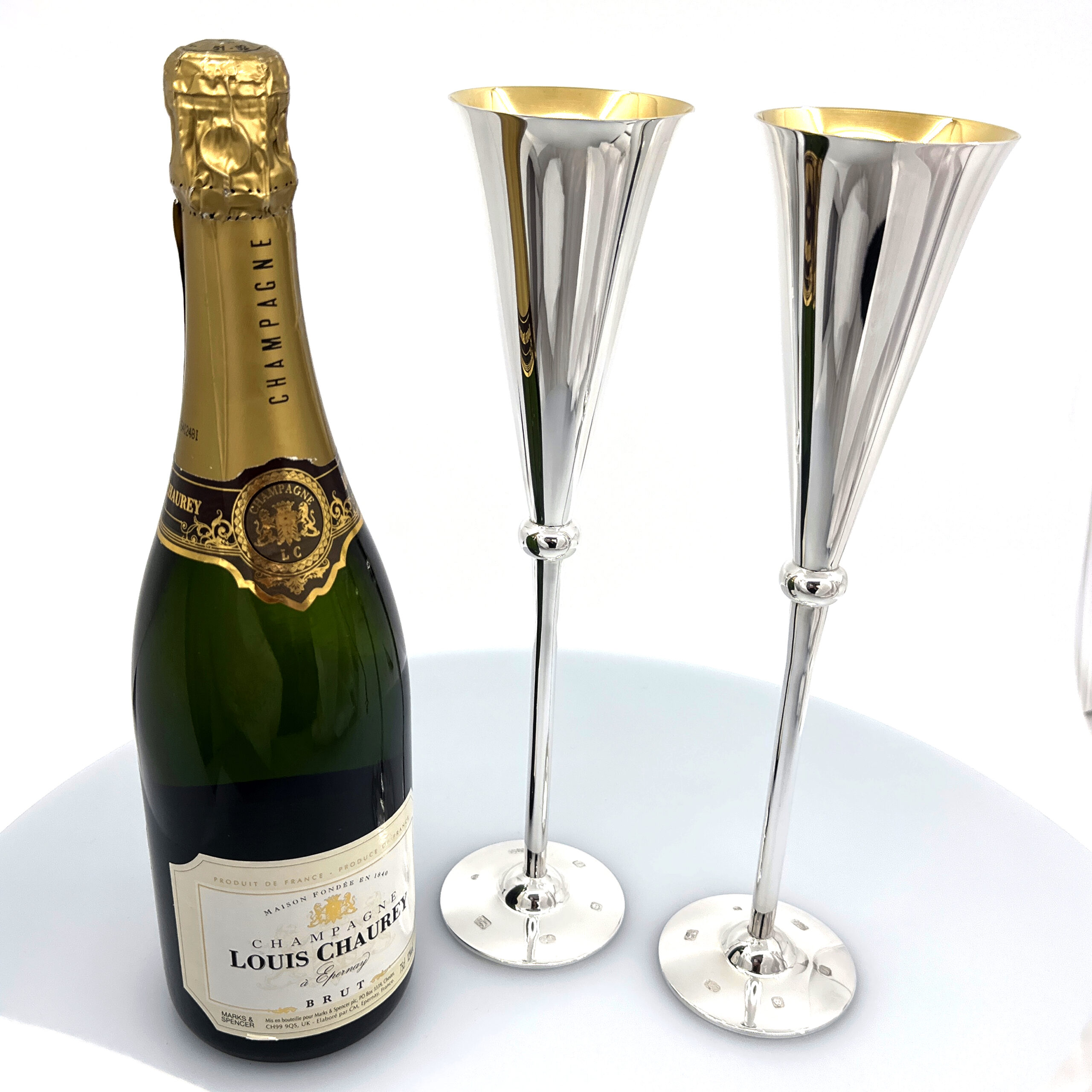 BOX27 (4) Pair Of Champagne Flutes With Gilded Interior, finished in 925 English Hallmarked Sterling Silver