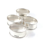Set Of Four Plain Oval Serviette Rings, finished in 925 English Hallmarked Sterling Silver