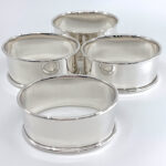 Set Of Four Plain Oval Serviette Rings, finished in 925 English Hallmarked Sterling Silver