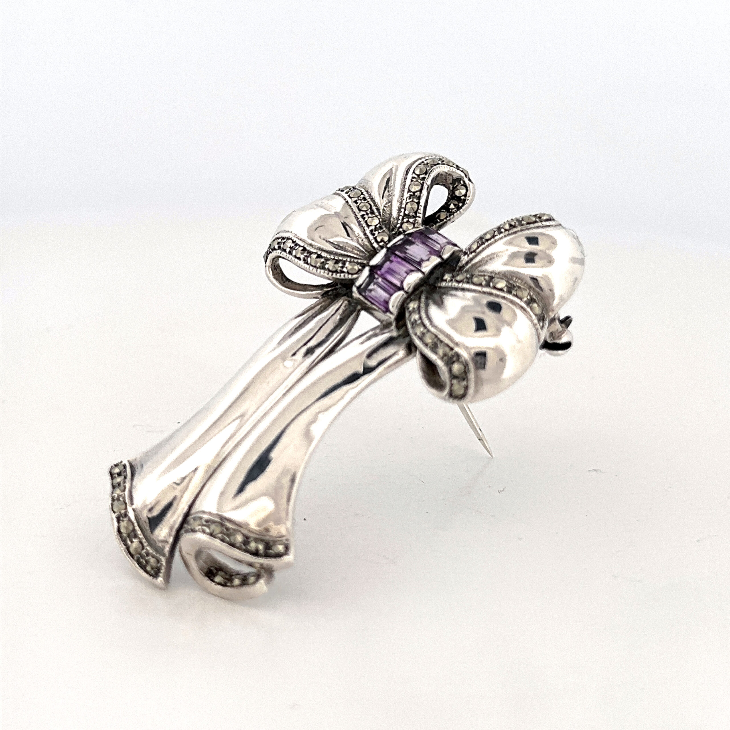 B351 (3) Bow Pin Brooch With Amethyst And Marcasite Finished In 925 English Hallmarked Sterling Silver