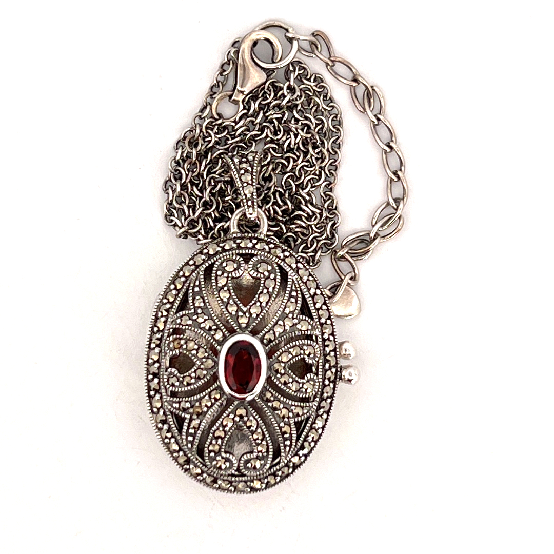 PT276 (5) Oval Locket Set With Garnet And Marcasite, Finished In 925 English Hallmarked Sterling Silver