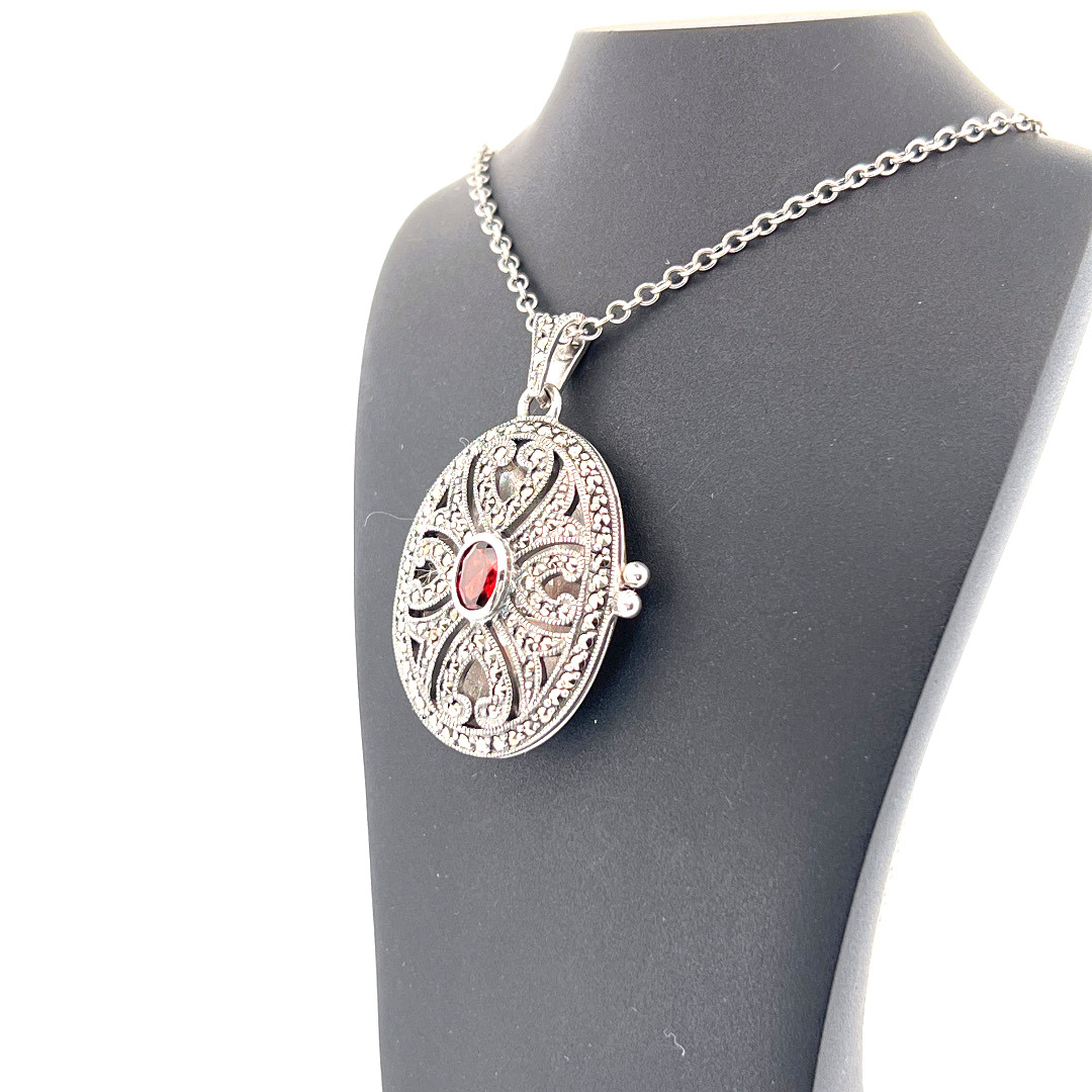 PT276 (6) Oval Locket Set With Garnet And Marcasite, Finished In 925 English Hallmarked Sterling Silver
