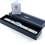Art Deco Watch With Mother Of Pearl Dial And Blue Sapphire Winder Finished In 925 English Hallmarked Sterling Silver