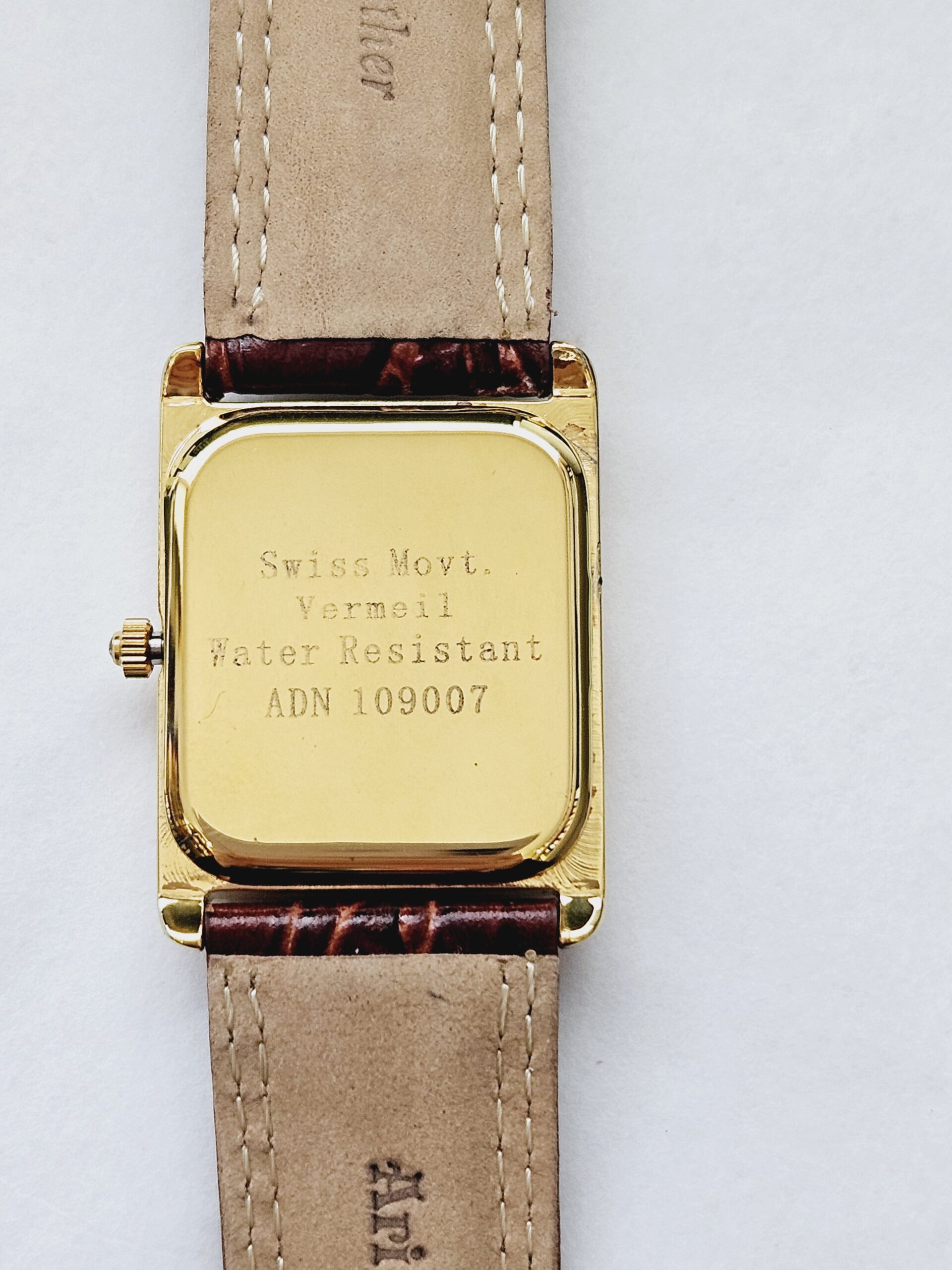 WTCH16 back Rectangular Watch With Brown Leather Strap And Blue Sapphire Winder Finished In 925 English Hallmarked Sterling Silver