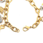 Charm Bracelet 1950s Style Gold Plated Metal Alloy Set With Clear Czech Crystals And Jewellers Enamel 7 Charm Bracelet 1950s Style Gold Plated Metal Alloy Set With Clear Czech Crystals And Jewellers Enamel