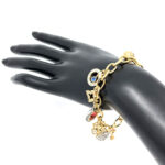 Charm Bracelet 1950s Style Gold Plated Metal Alloy Set With Clear Czech Crystals And Jewellers Enamel 9 Charm Bracelet 1950s Style Gold Plated Metal Alloy Set With Clear Czech Crystals And Jewellers Enamel