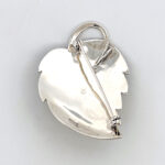 Ladybird On Leaf Brooch With Enamel And Marcasite, finished in 925 English Hallmarked Sterling Silver