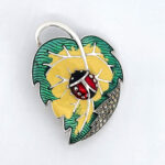 Ladybird On Leaf Brooch With Enamel And Marcasite, finished in 925 English Hallmarked Sterling Silver
