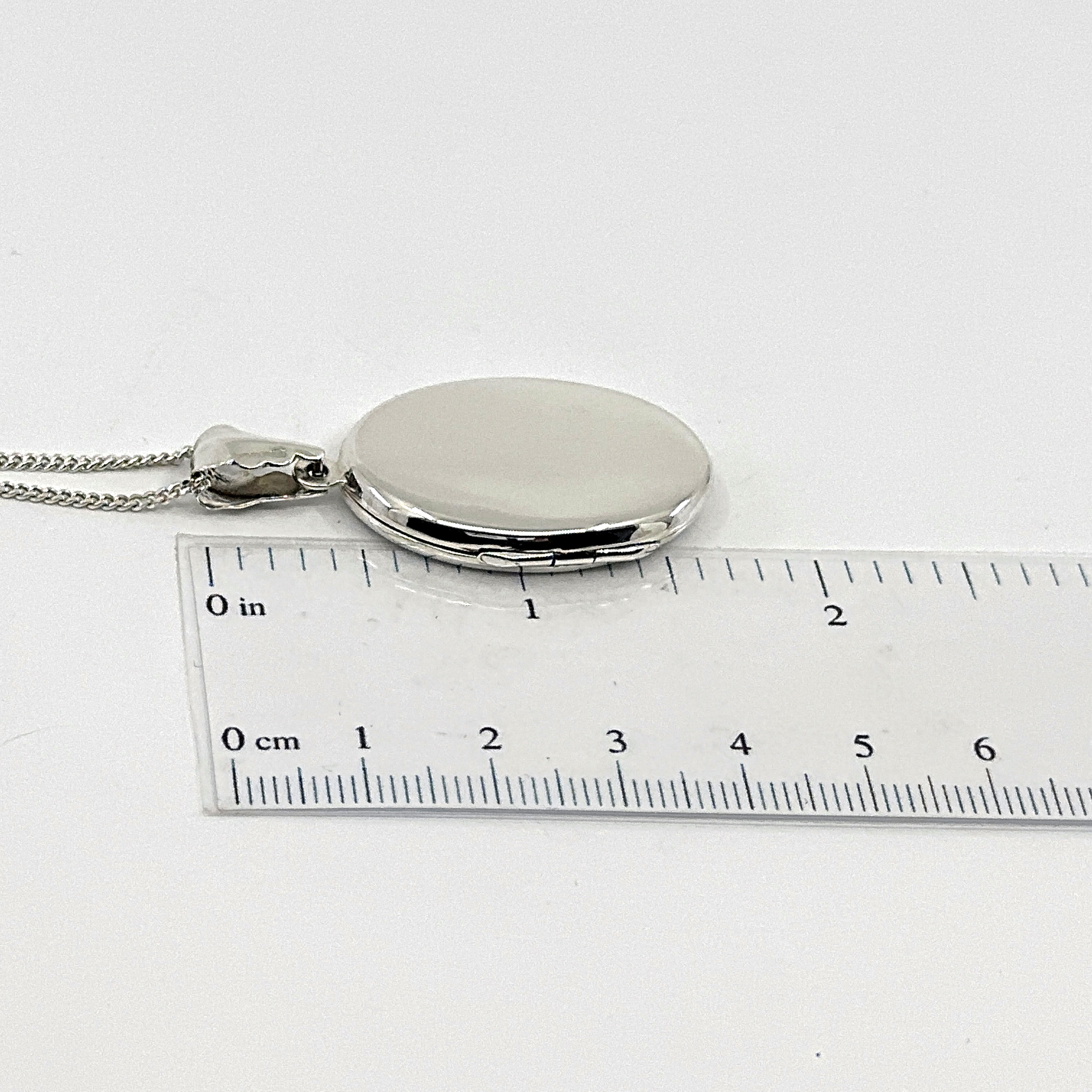PT466 (2) Oval Locket On Curb Chain, Finished In 925 English Hallmarked Sterling Silver
