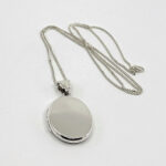 Oval Locket On Curb Chain, Finished In 925 English Hallmarked Sterling Silver 5 Oval Locket On Curb Chain, Finished In 925 English Hallmarked Sterling Silver