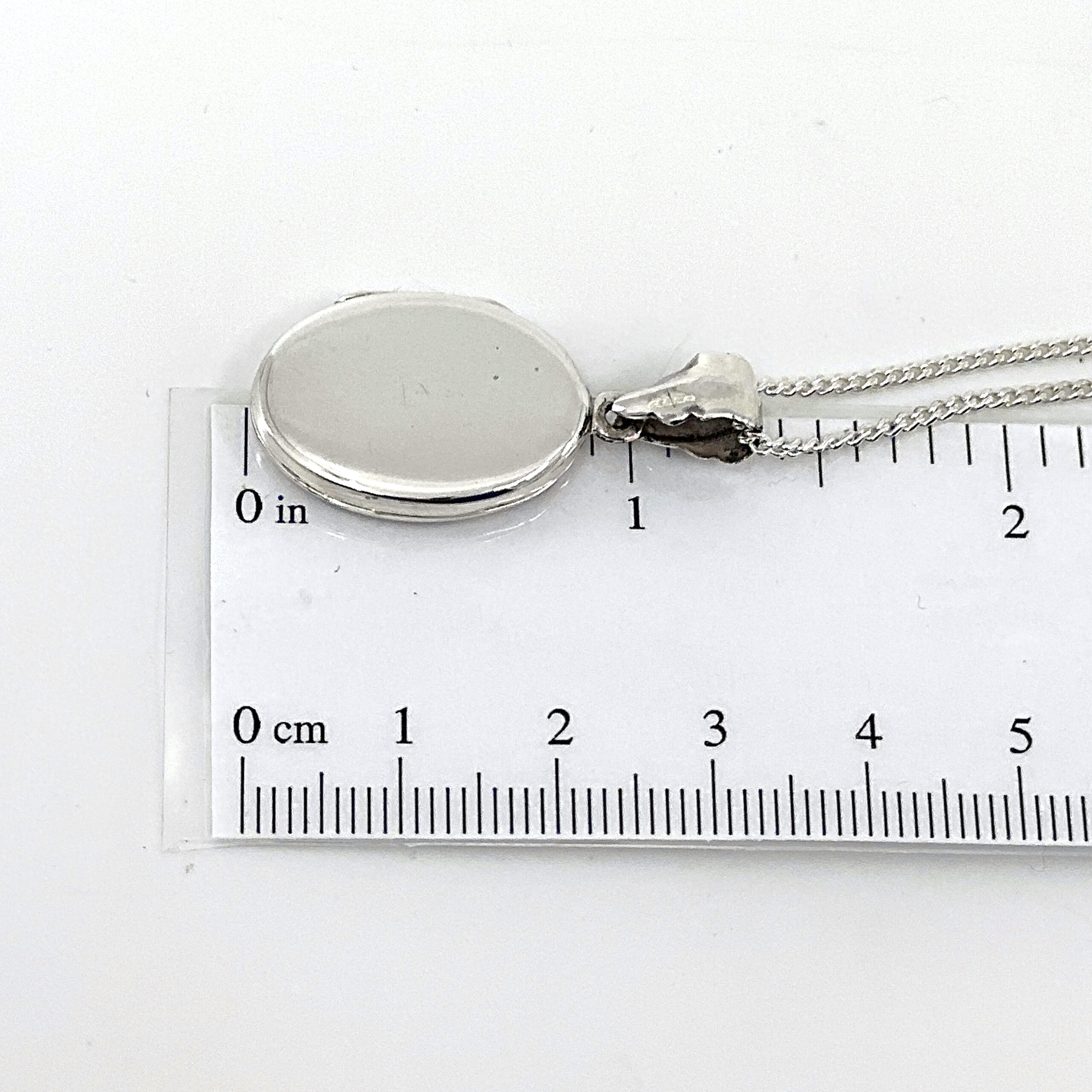 PT464 (2) Small Oval Locket On Curb Chain, Finished In 925 English Hallmarked Sterling Silver