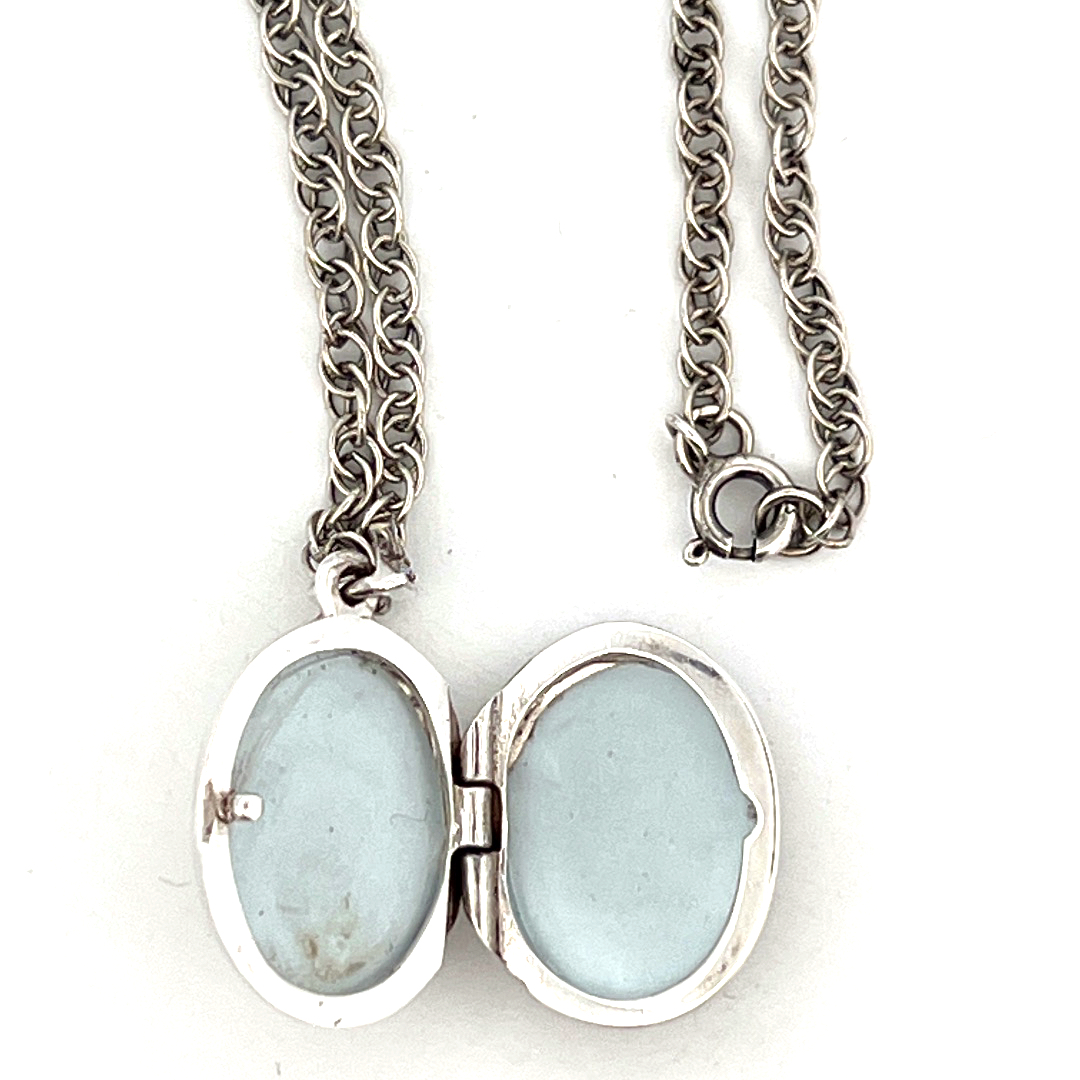 PT201 (2) Small Oval Fleur De Lys Locket Set with Marcasite on Rope Chain, finished in 925 English Hallmarked Sterling Silver