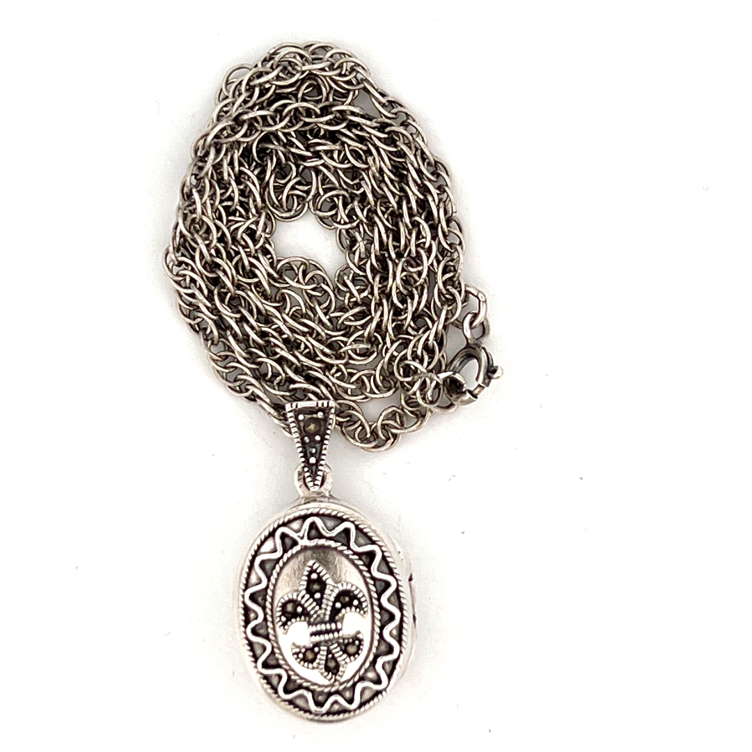PT201 (5) Small Oval Fleur De Lys Locket Set with Marcasite on Rope Chain, finished in 925 English Hallmarked Sterling Silver