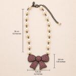 Swarovski Crystal and Pearl Bow Statement Necklace