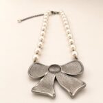 Swarovski Crystal and Pearl Bow Statement Necklace