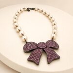 Swarovski Crystal and Pearl Bow Statement Necklace
