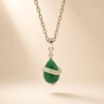 Sterling Silver Snake Wrapped Green Enamel Egg Pendant