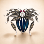 Spider brooch with enamel, marcasite and crystals, finished in 925 English hallmarked sterling silver.