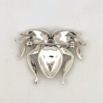 Reverse pin clasp detail of the sterling silver spider brooch with enamel, marcasite and crystals.