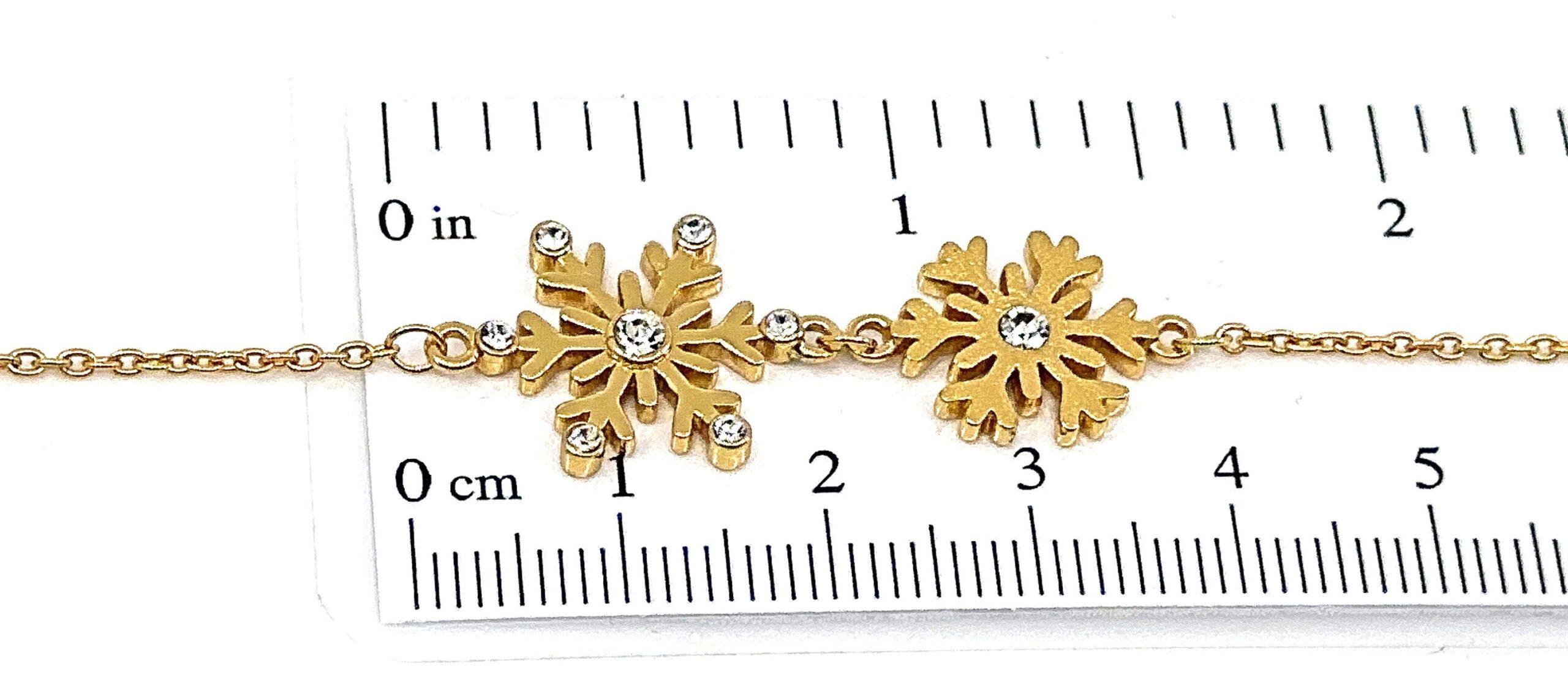 il-fullxfull.6280297477-gwfq.jpg Gold-Plated Sterling Silver Snowflake Crystal Bracelet