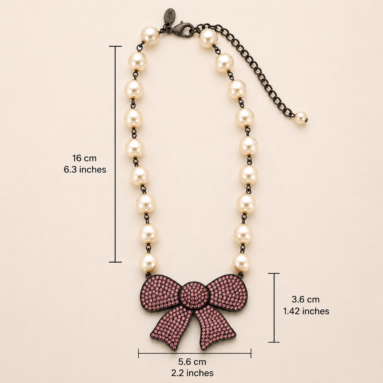 il-fullxfull.8036735536-h97y-il-fullxfull.8036735536-h97y.jpg Swarovski Crystal and Pearl Black Rhodium Bow Necklace