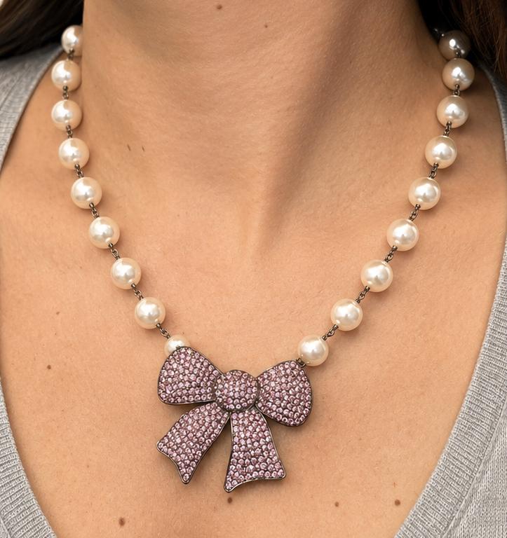 il-fullxfull.8084546103-aank-il-fullxfull.8084546103-aank.jpg Swarovski Crystal and Pearl Black Rhodium Bow Necklace