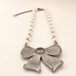 Swarovski Crystal and Pearl Black Rhodium Bow Necklace 7 Swarovski Crystal and Pearl Black Rhodium Bow Necklace