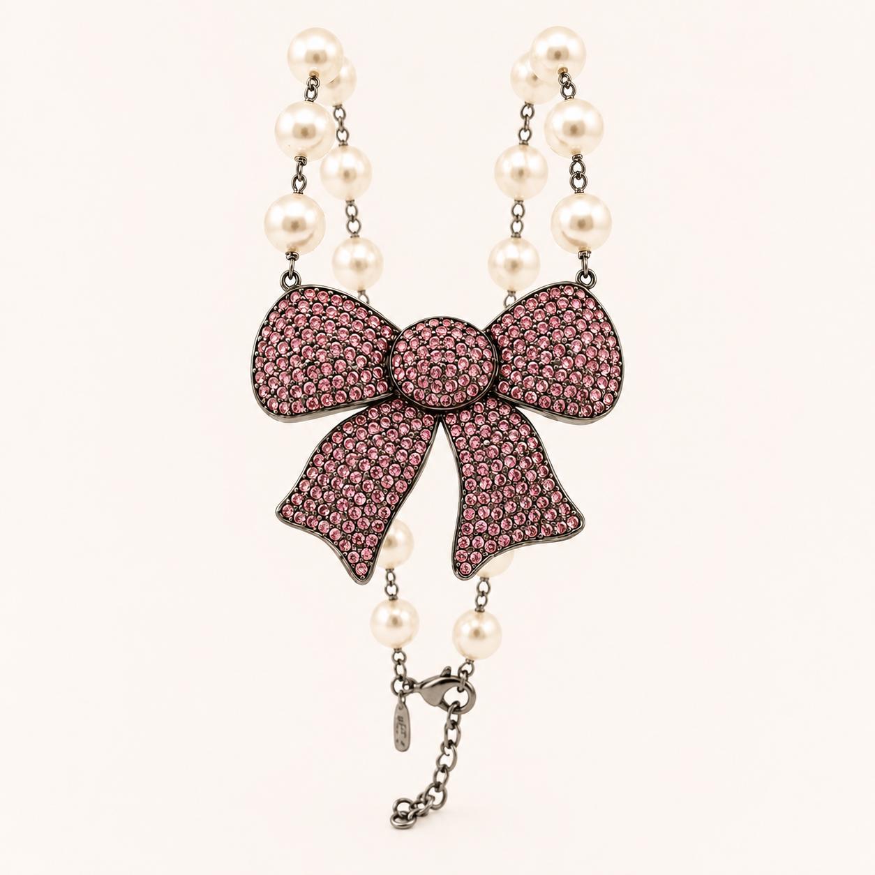 il-fullxfull.8084546335-l7cl-il-fullxfull.8084546335-l7cl.jpg Swarovski Crystal and Pearl Black Rhodium Bow Necklace