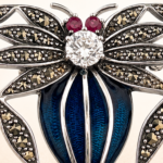 Sterling silver spider brooch with enamel, marcasite and crystals.